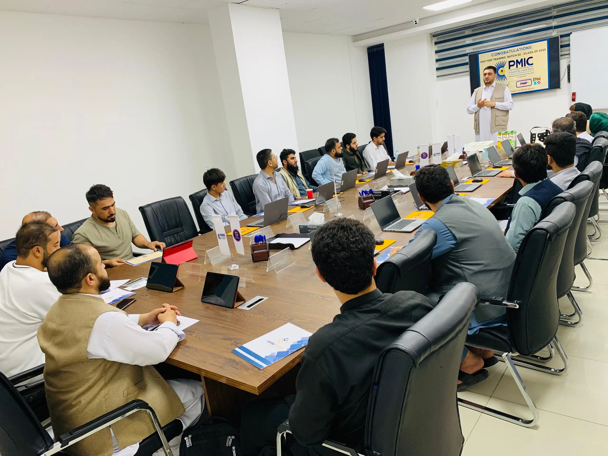 Abdul Habib Aulfat teaching students in Lazuli PMIC classroom